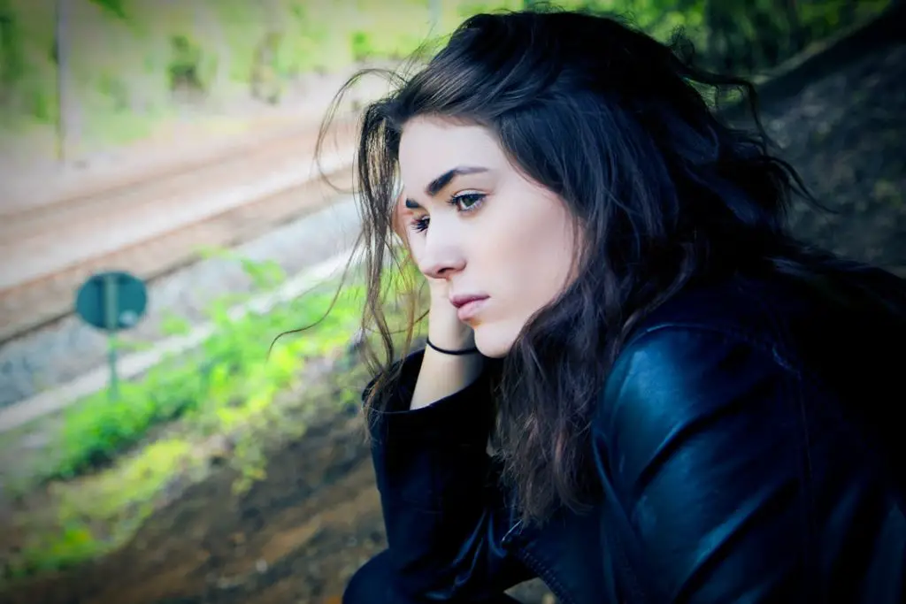 girl sitting under tree 2