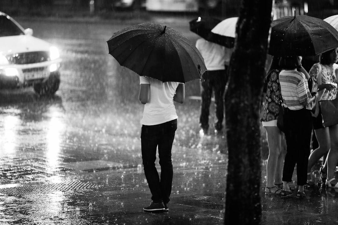 girl walking in rain 1 1