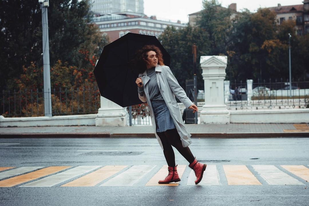 girl walking in rain 1